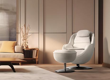 Massage recliner and footstool in a bright living room.