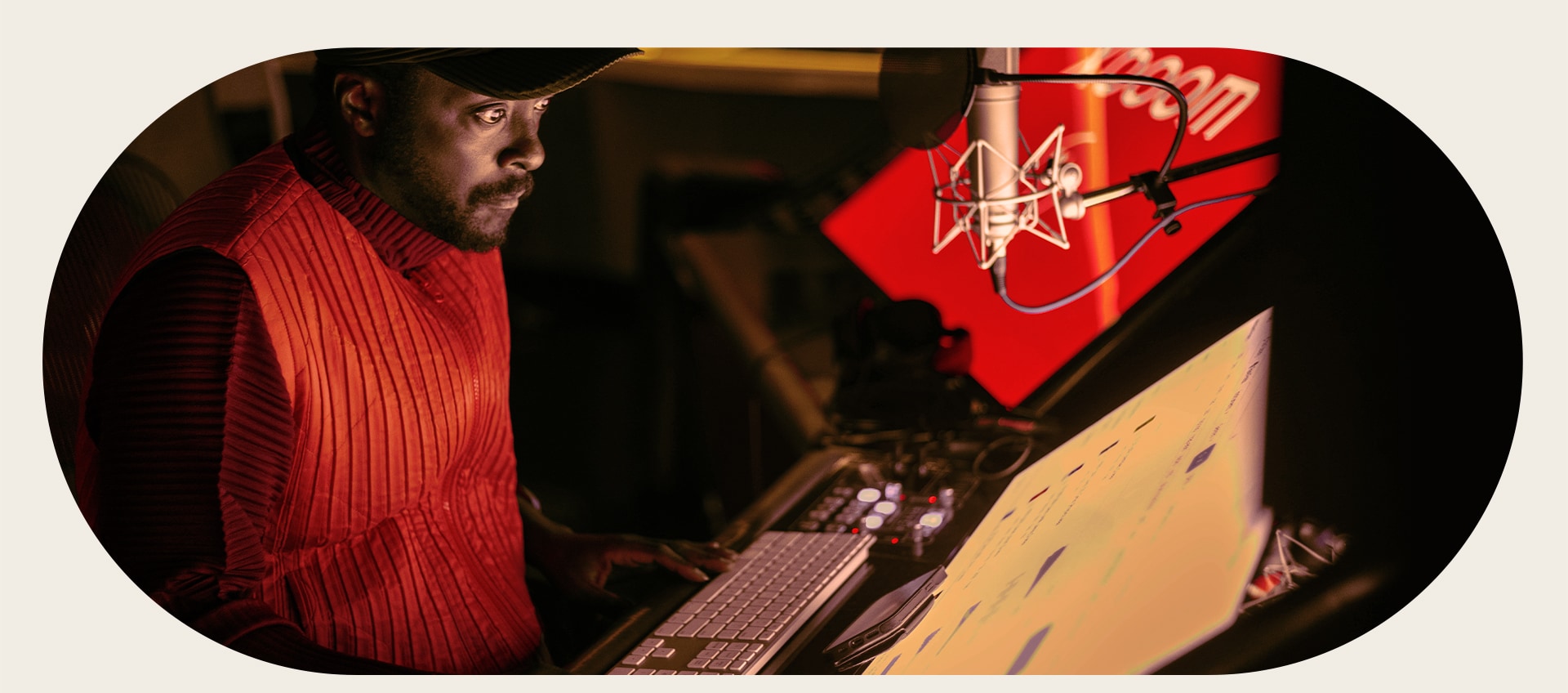 will.i.am working in studio on xboom sound.